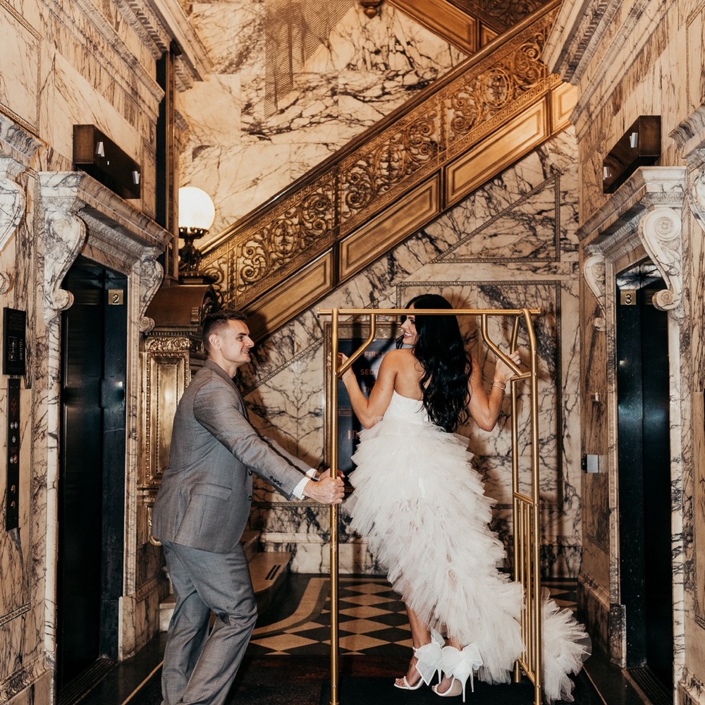 Elegant White Feathered Gown